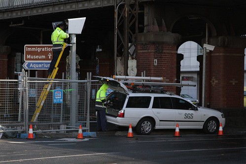 Contractors checking up on a combined speed and red light camera