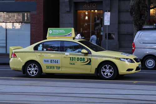 Rear and rooftop taxi advertising from 'Ultimate Media'