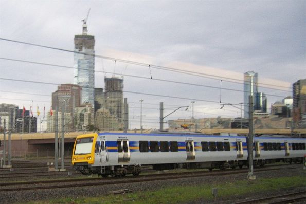 X'Trapolis in front of an under construction Eureka Tower