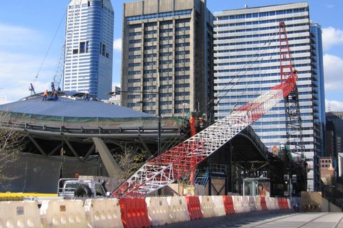 The huge crane used to remove the three tower cranes from the site