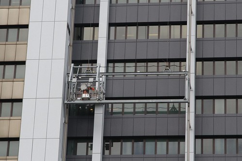 Painters at work on the northern facade