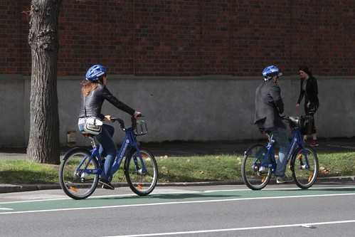 Melbourne Bike Share users head down a bike lane