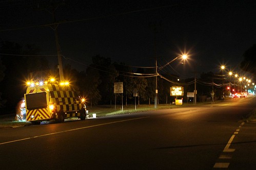 Road maintenance vehicle at work on Anderson Road, Sunshine - one of the roads upgraded by Netflow under the Western Roads Upgrade public private partnership