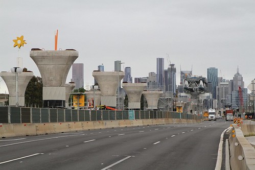 Piers for the elevated roadway in place along the median strip of Footscray Road