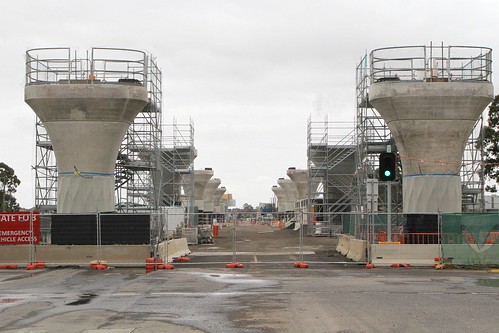 Piers for the elevated roadway in place along the median strip of Footscray Road