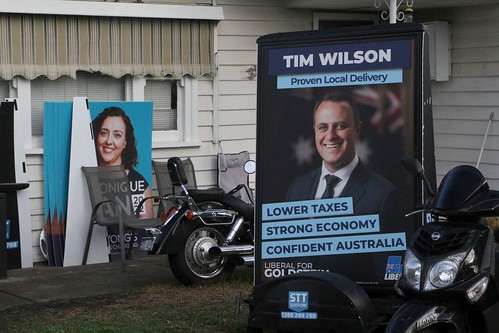 'Tim Wilson, Liberal for Goldstein' advertising signs hooked up behind motor scooters