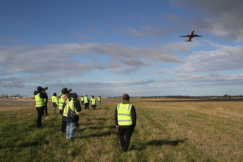 Our group of airside planespotters photograph a Jetstar A320 after take off from runway 34