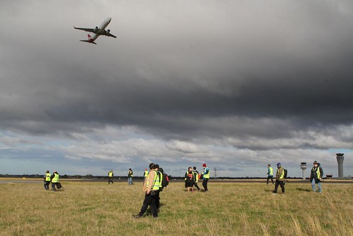 Time for us planespotters to head back to the bus, as a Qantas 737 passes overhead