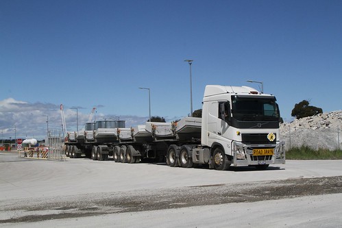 A-double semi trailer departs the Benalla precast facility with four concrete tunnel lining segments for the West Gate Tunnel