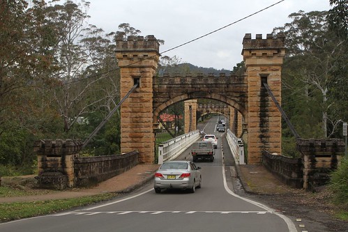 Cars queued to cross the Hampden Bridge, with three cars headed the other way