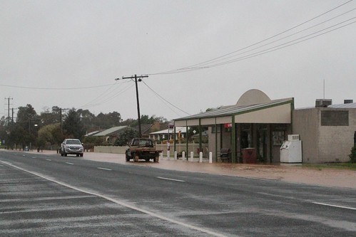 Rising flood waters on the main street of Colbinabbin