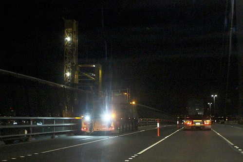 Two outer lanes closed and 40 km/h speed restriction while the MOOG MBI 200 bridge inspection vehicle is deployed to inspect the underside of the bridge deck