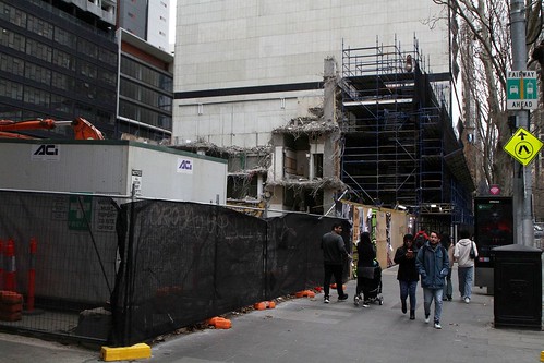 Scaffolding covers the Collins Street frontage to the 600 Collins Street demolition site