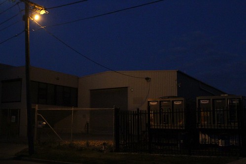 'Watchman' security lighting shine on private property from utility owned power poles