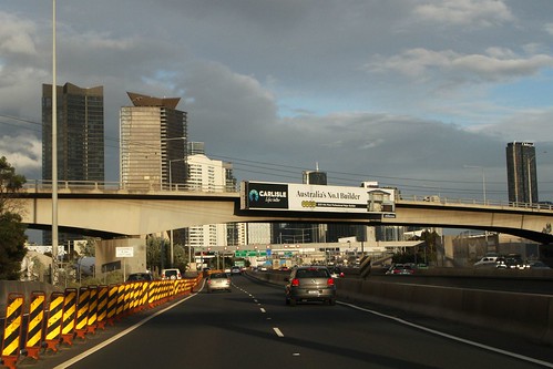 Fixed billboard on the Ingles Street bridge over the West Gate Freeway at Port Melbourne