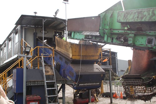 Large bits of material from the Sternsieb 2F material screener get sent into the sorting shed so the waste can be removed by hand