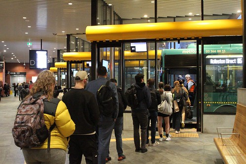 Passengers line up inside the indoor bus terminal at Christchurch