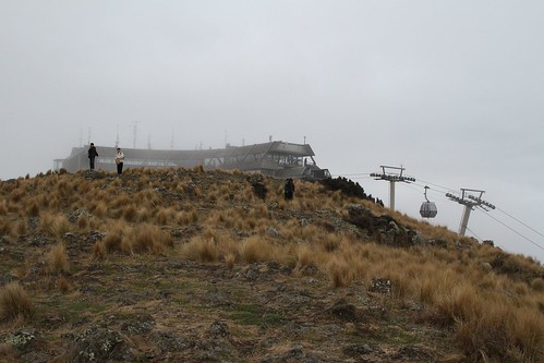 Christchurch Gondola terminal peeking out of the fog atop Mount Cavendish