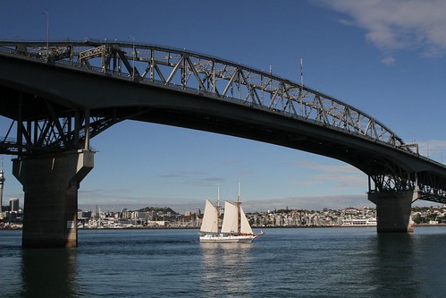 New Zealand Maritime Museum sailing ship 'Ted Ashby' beneath the Auckland Harbour Bridge