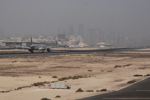 Qatar Airways jet taking off from runway 33 at Doha