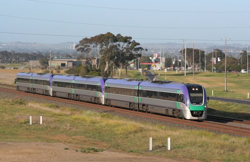 VL01 leads two classmates on an up Geelong express service at Corio