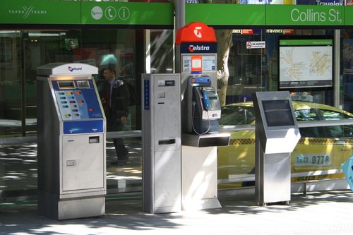 Metcard machine, change machine, Telstra payphone and SmartGuide journey planner at the Town Hall superstop