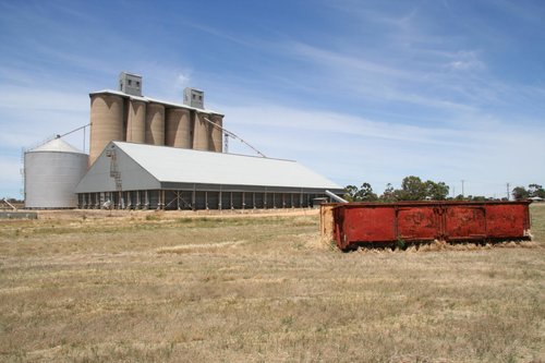 Pair of GYs abandoned in the paddock beside the grain silos