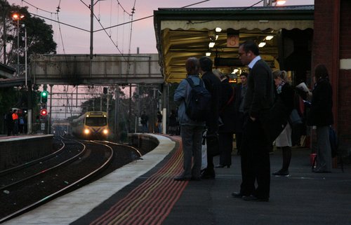 Commuters wait for an up train at Footscray