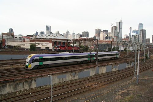 VLocity VL05 passes the former Hump crest bound for Southern Cross, as N459 waits on the loco track in the background