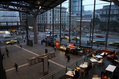 Some enjoy a drink in the bar, as late evening commuters trickle in