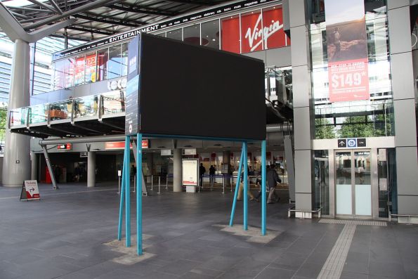 'Temporary' suburban CRT next train displays finally covered up, over 3 years since the supposed 'completion' of the station. How long until they actually go?