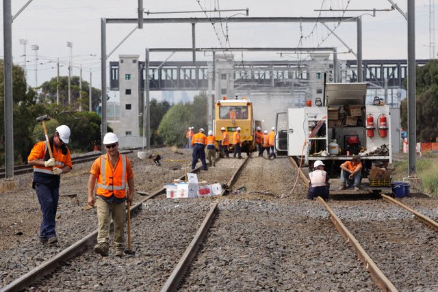 Track workers at the down end