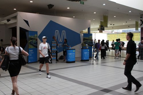 Myki stand on the concourse, outside the Metro information kiosk