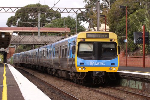 Metro liveried EDI Comeng 440M on the up at Hawksburn