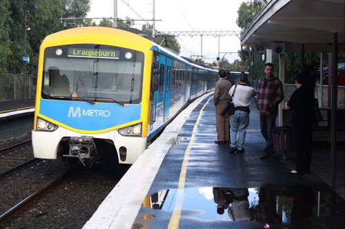 A 'thoroughly clean' Siemens train arrives into Strathmore station to pick up Premier John Brumby and Public Transport Minister Martin Pakula