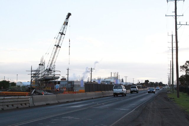 Crane on the northern side of the line, work continuing on the bridge