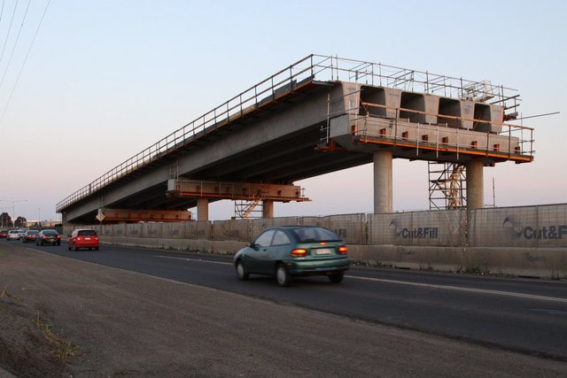 Three of three straight approach spans in place, two lanes wide