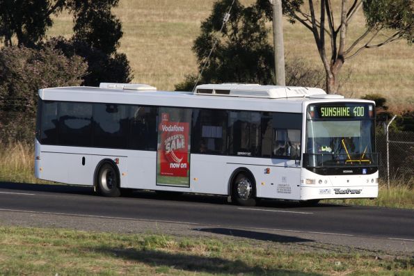 Plain white liveried Westrans bus #108 6039AO on a route 400 service at Deer Park