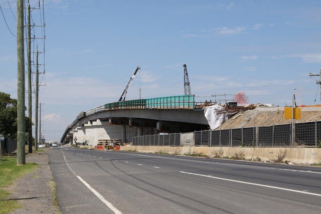 Earthern approach ramp underway at the west end