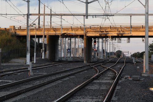 Signals governing entry to Craigieburn Yard hiding beneath the Hume Highway bridge