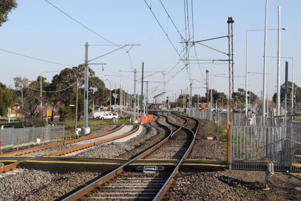 New pedestrian crossing at the down end of Lalor station, new track waiting to be tied in