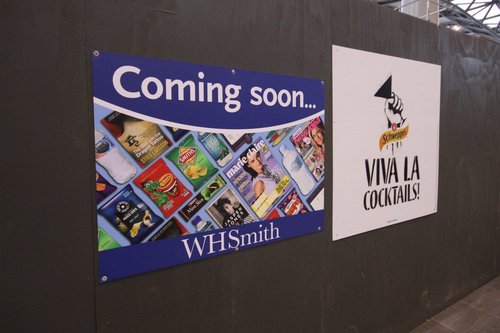 Coming soon: WHSmith, yet another newsagent / convenience store. 20 metres away is 'Relay', the red fronted store that sells the exact same crap