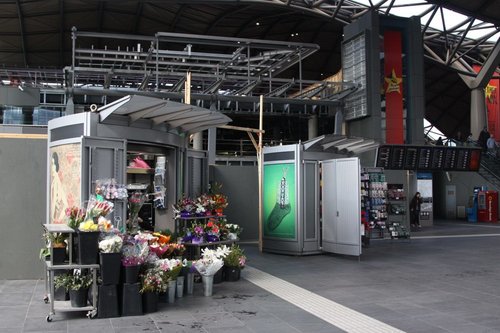 Stalls at the Collins Street entry to Southern Cross: a florist makes sense, but socks?