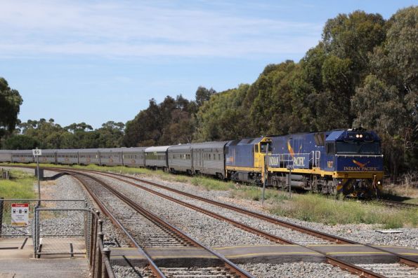 NR27 leads DL40 on the Indian Pacific out of town at North Adelaide