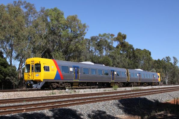 Comeng 3130 and classmate head into town at Torrens Junction