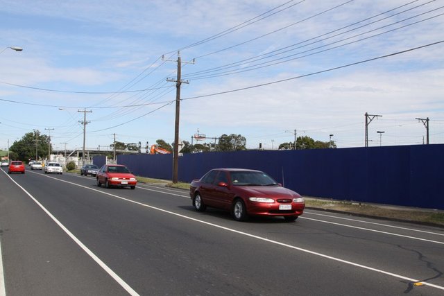 Big blue fence along Buckley Street