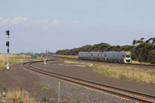 Future Manor Junction and a down Geelong service, one of two 7-car consists that run on the Geelong line in peak