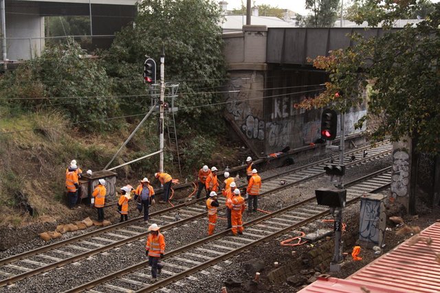 Working on the signals for the regraded track beneath Albert Street