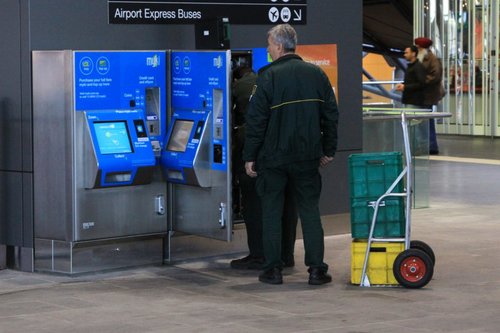 Armaguard crew do a cash pickup at Southern Cross