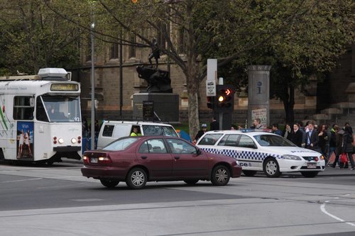 Z1.92 waiting to cross the blocked intersection of Flinders and Swanston Streets, the police can't get through either!